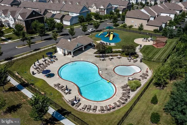 a view of a swimming pool with a garden