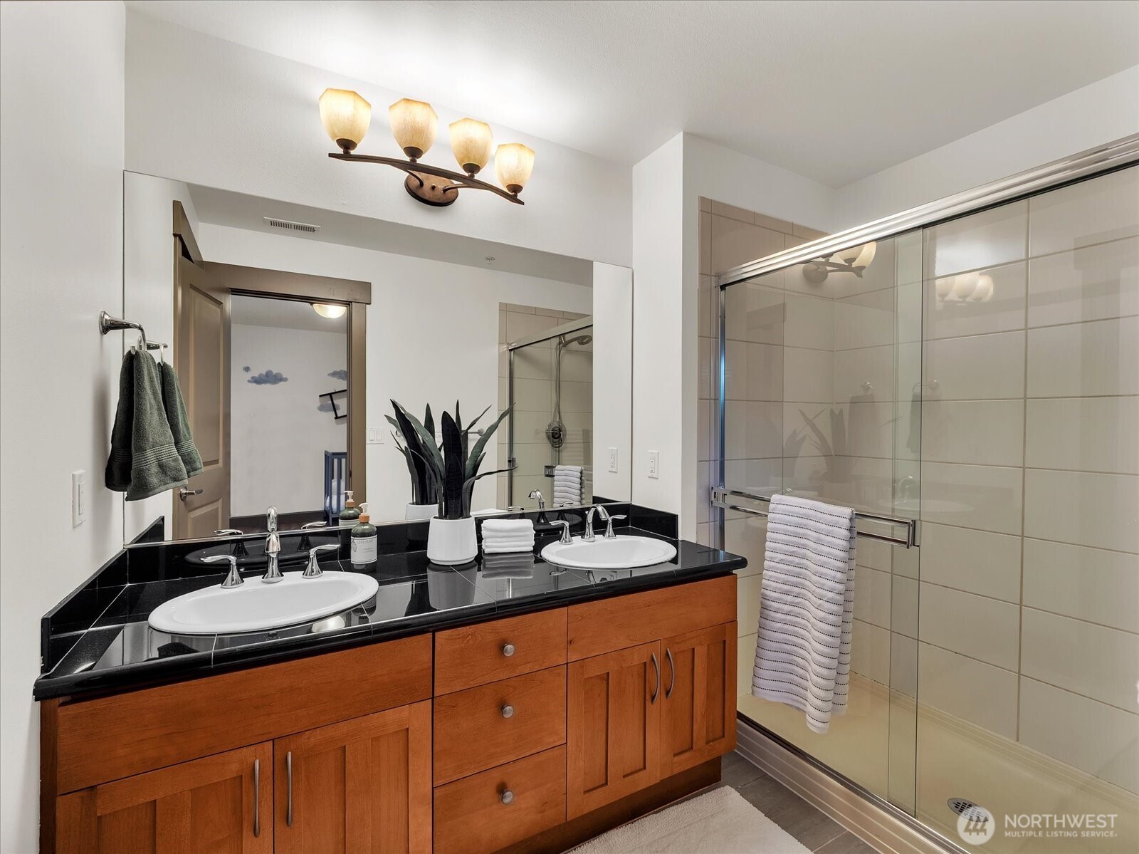 2115 201st Place Southeast, Unit K2 Bothell, WA 98012 - Photo 20 of 28 a bathroom with double sink and a mirror