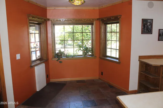 an empty room with windows