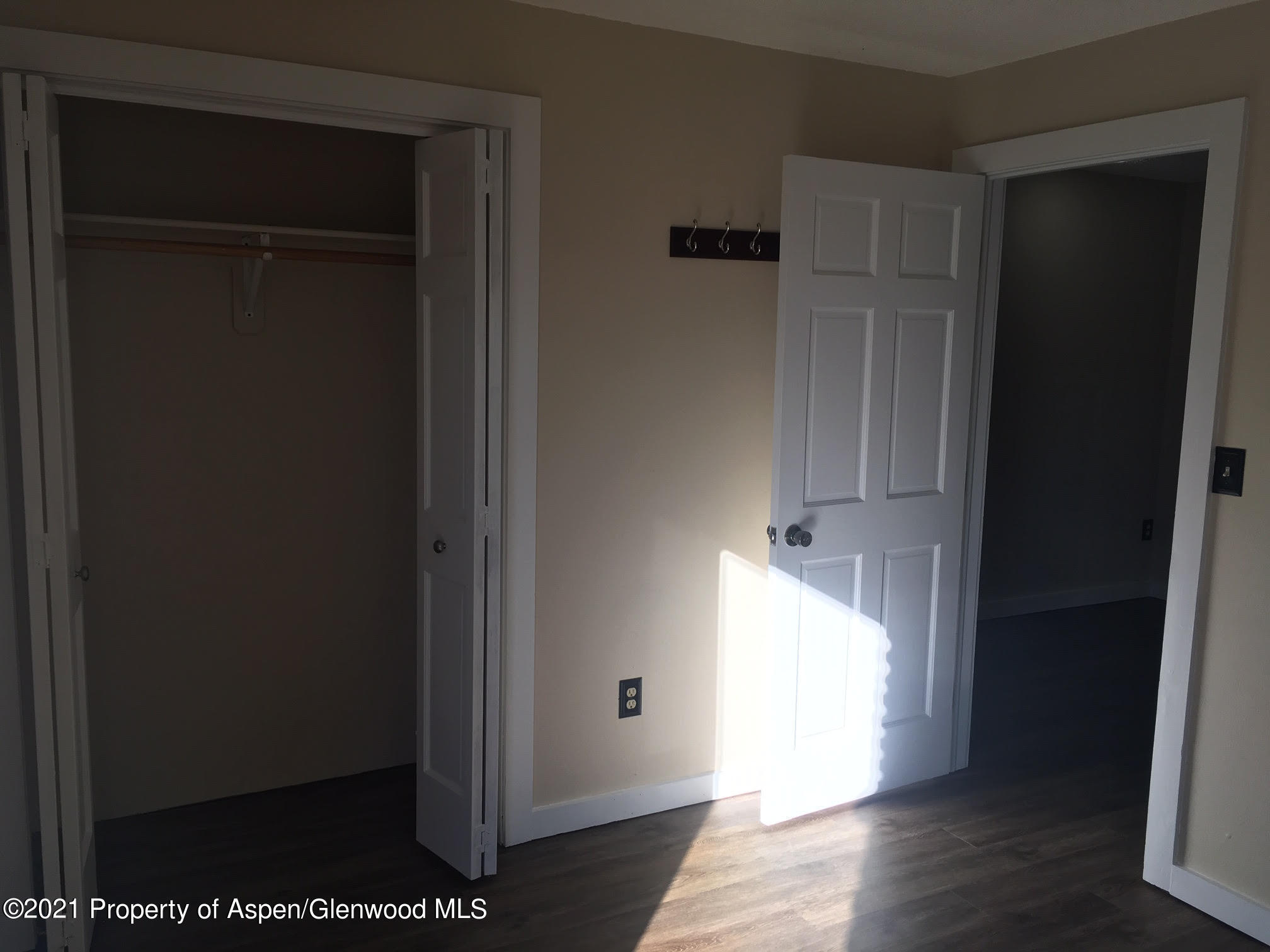 1101 Village Road, Unit LL3B Carbondale, CO 81623 - Photo 17 of 17 wooden floor in an empty room