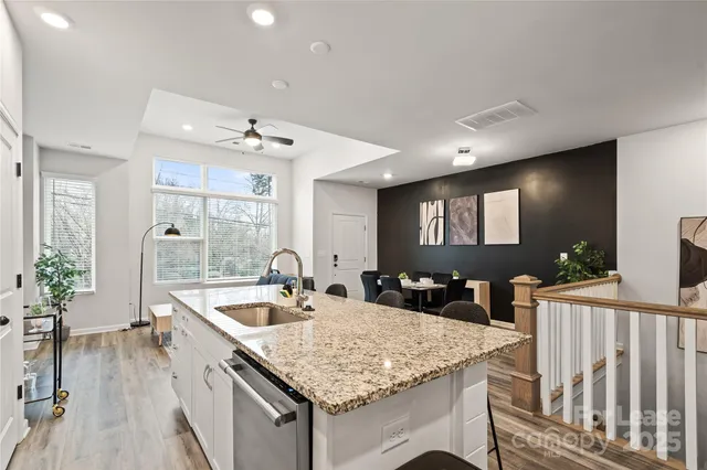 a kitchen with a counter top space and a sink