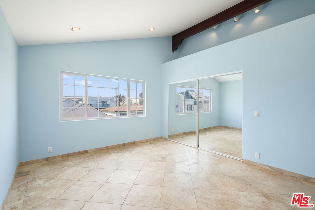 148 Van Nuys Avenue Oxnard, CA 93035 - Photo 26 of 37 a view of an empty room with a window