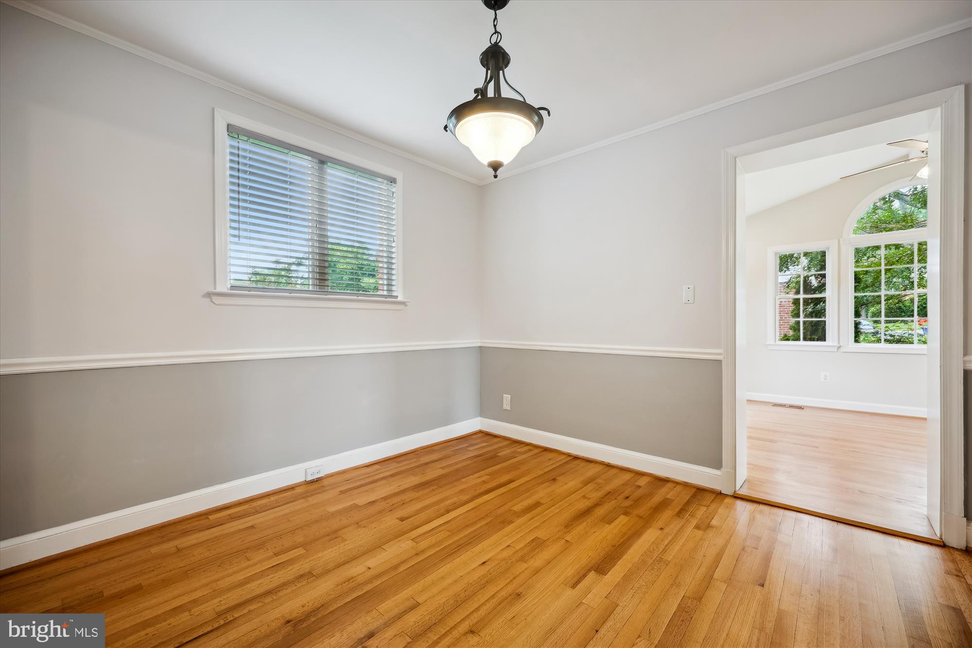 2013 Dayton Street Silver Spring, MD 20902 - Photo 11 of 75 an empty room with wooden floor and windows