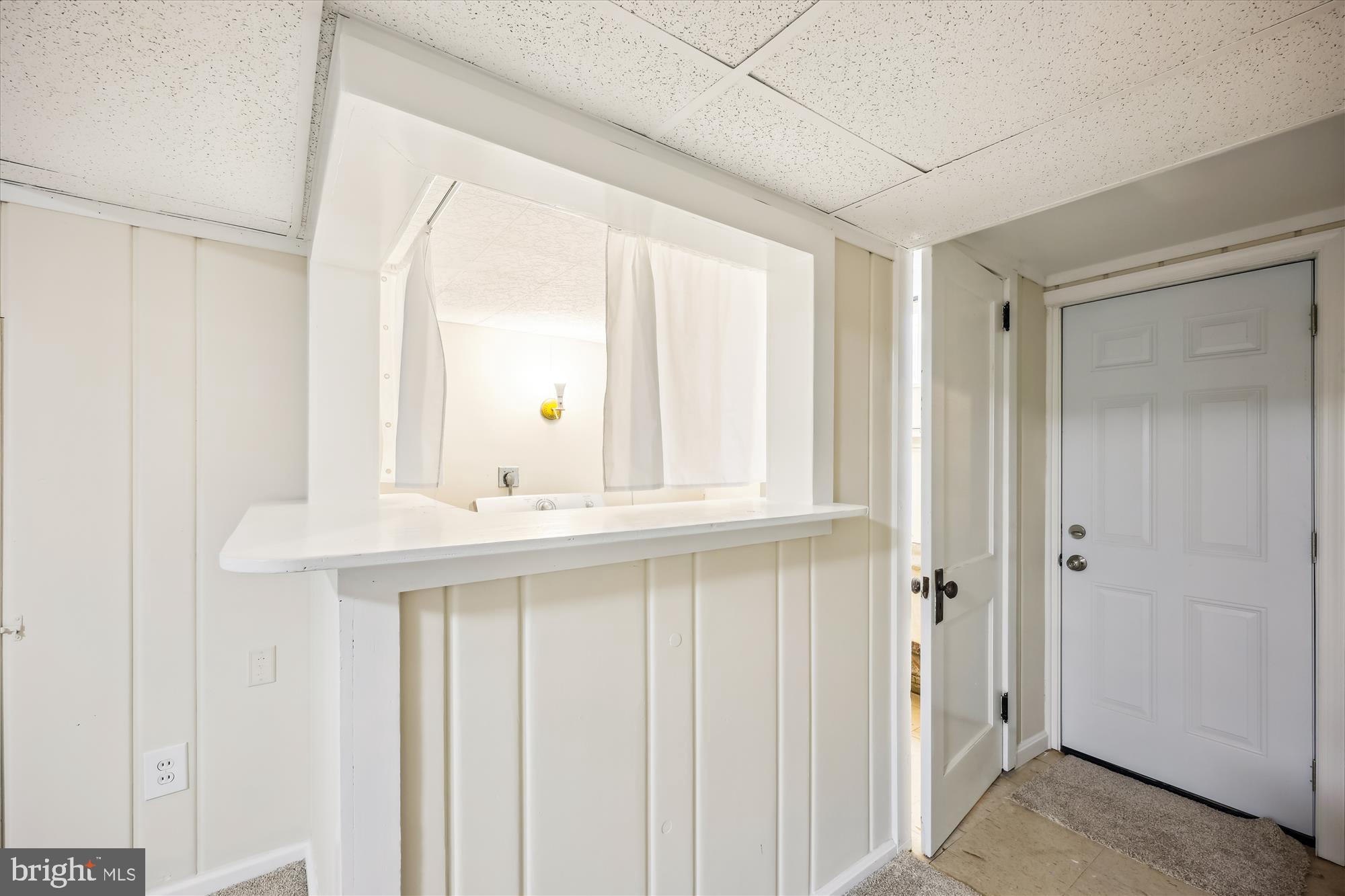 2013 Dayton Street Silver Spring, MD 20902 - Photo 35 of 75 a bathroom with a sink a mirror and a window