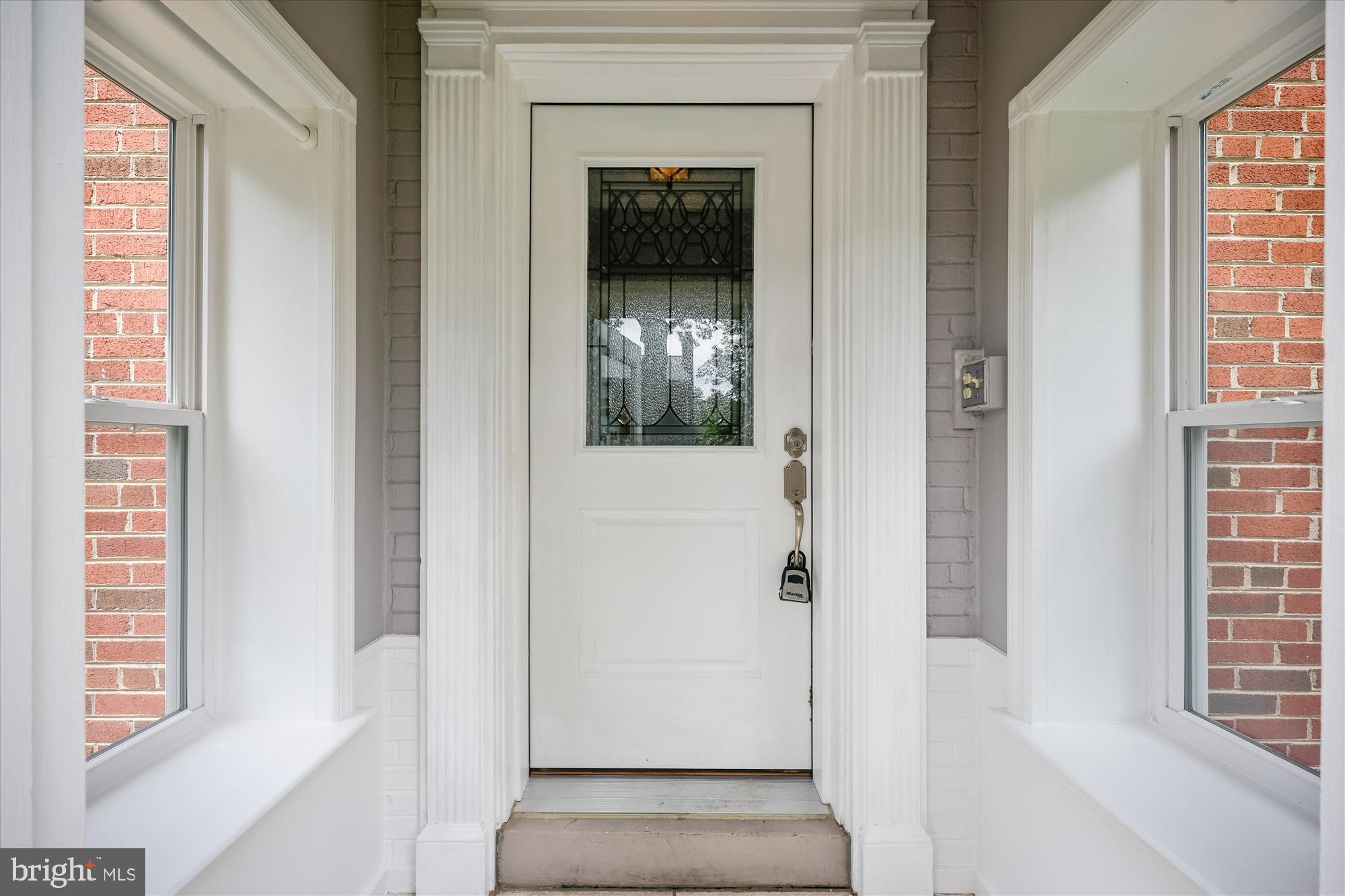 2013 Dayton Street Silver Spring, MD 20902 - Photo 6 of 75 a view of a hallway with wooden floor and a front door