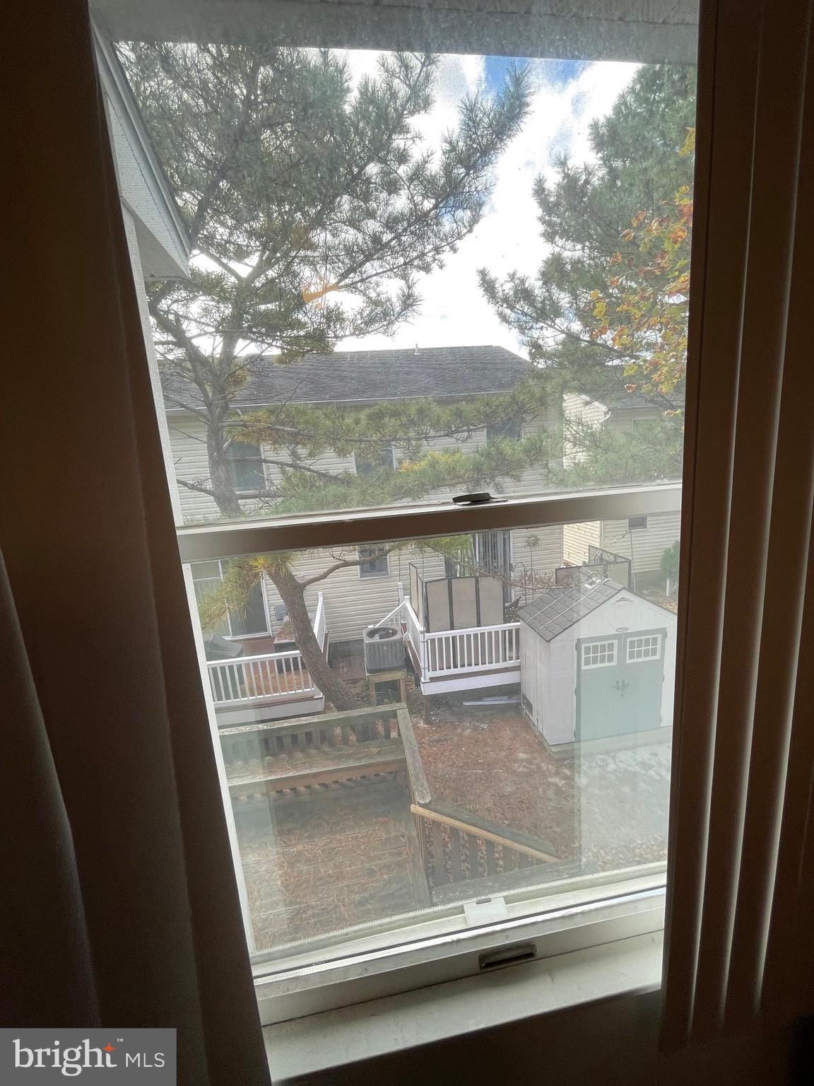 153 Captains Quarters Road Ocean City, MD 21842 - Photo 15 of 22 a view of sky from window