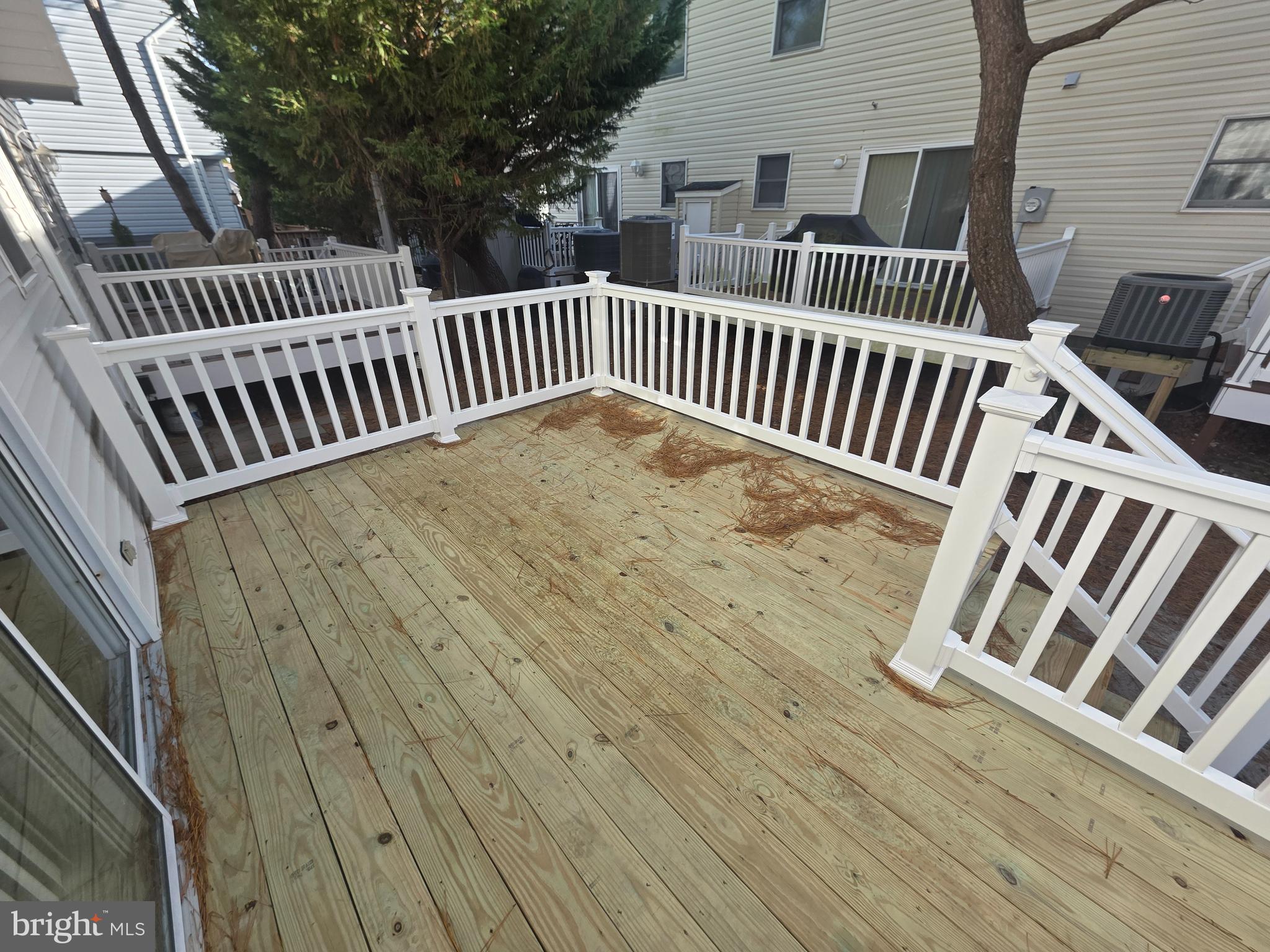 153 Captains Quarters Road Ocean City, MD 21842 - Photo 20 of 22 a view of deck with deck and wooden floor