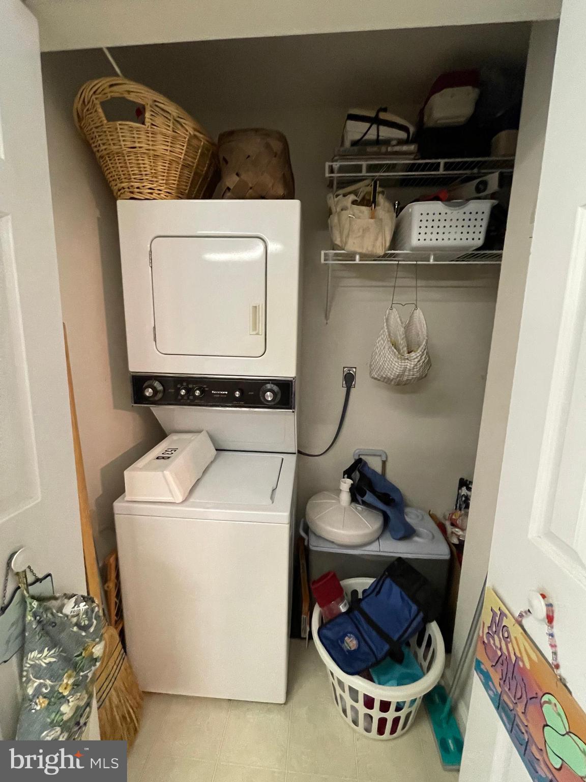 153 Captains Quarters Road Ocean City, MD 21842 - Photo 9 of 22 a utility room with dryer and washer
