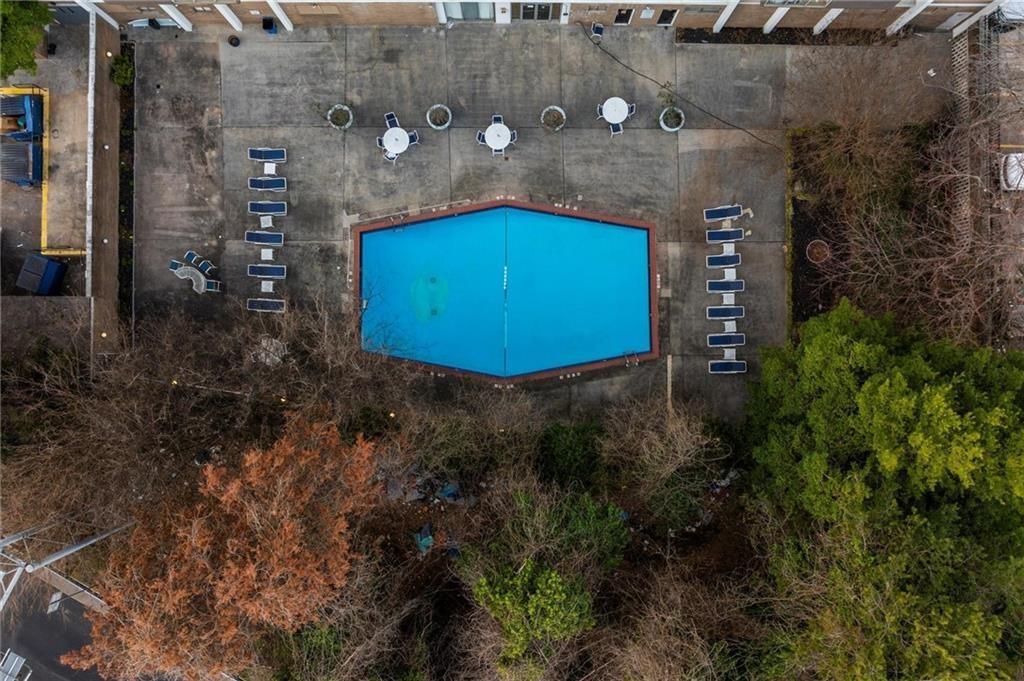 215 Piedmont Avenue Northeast, Unit 1608 Atlanta, GA 30308 - Photo 21 of 25 an aerial view of a house with a backyard