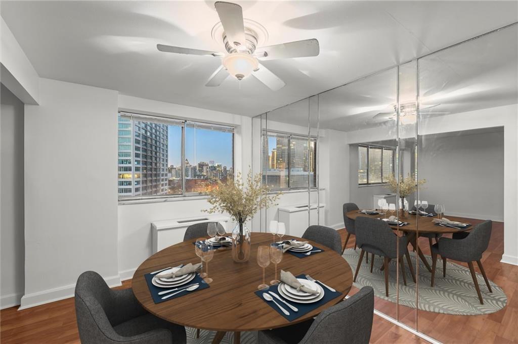 215 Piedmont Avenue Northeast, Unit 1608 Atlanta, GA 30308 - Photo 5 of 25 a view of a dining room with furniture window and outside view