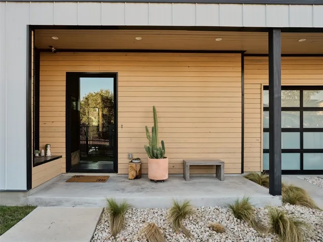 a view of a house with a swimming pool