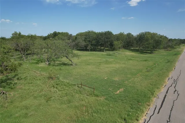 a view of a lush green field