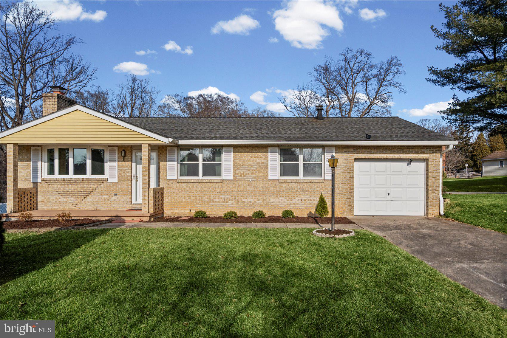 4006 Silvage Road Baltimore, MD 21236 - Photo 2 of 44 a front view of a house with a yard