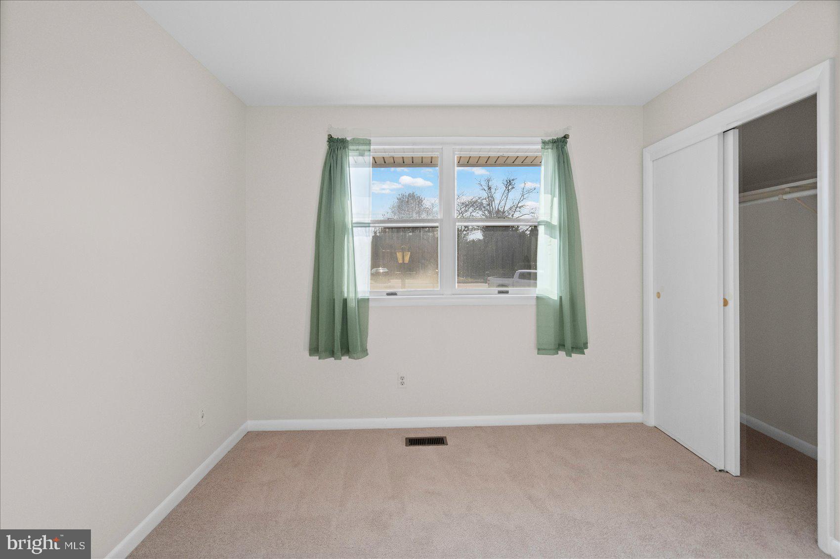 4006 Silvage Road Baltimore, MD 21236 - Photo 29 of 44 an empty room with a window