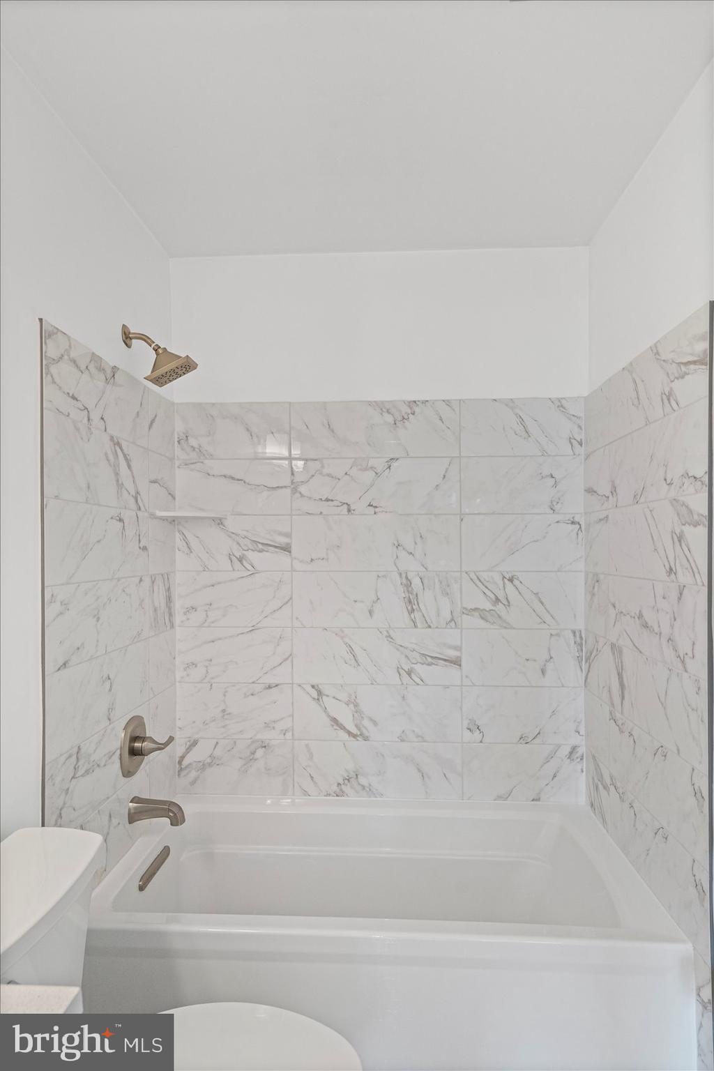 4006 Silvage Road Baltimore, MD 21236 - Photo 32 of 44 a bathroom with a bathtub