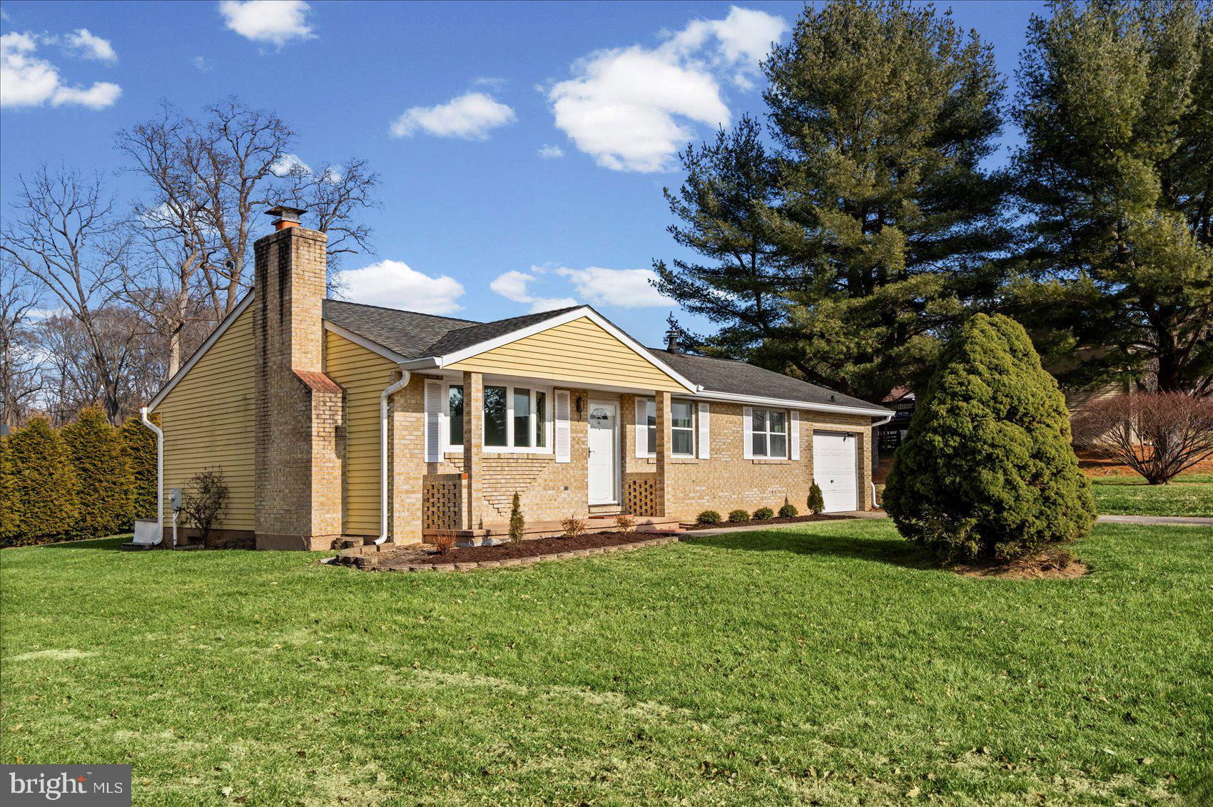 4006 Silvage Road Baltimore, MD 21236 - Photo 4 of 44 a front view of a house with a yard
