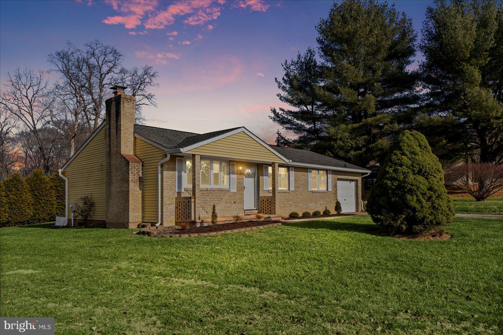 4006 Silvage Road Baltimore, MD 21236 - Photo 5 of 44 a front view of a house with a yard