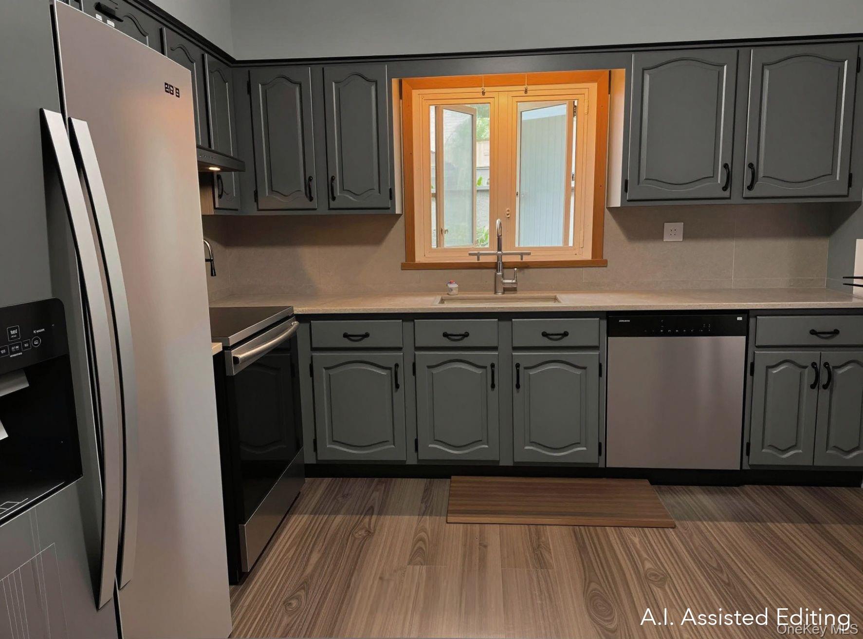 94 Booth Road Chester, NY 10918 - Photo 6 of 21 Kitchen featuring mid tone steel gray cabinetry, stainless steel appliances, light countertops, and wood-finish LVT flooring