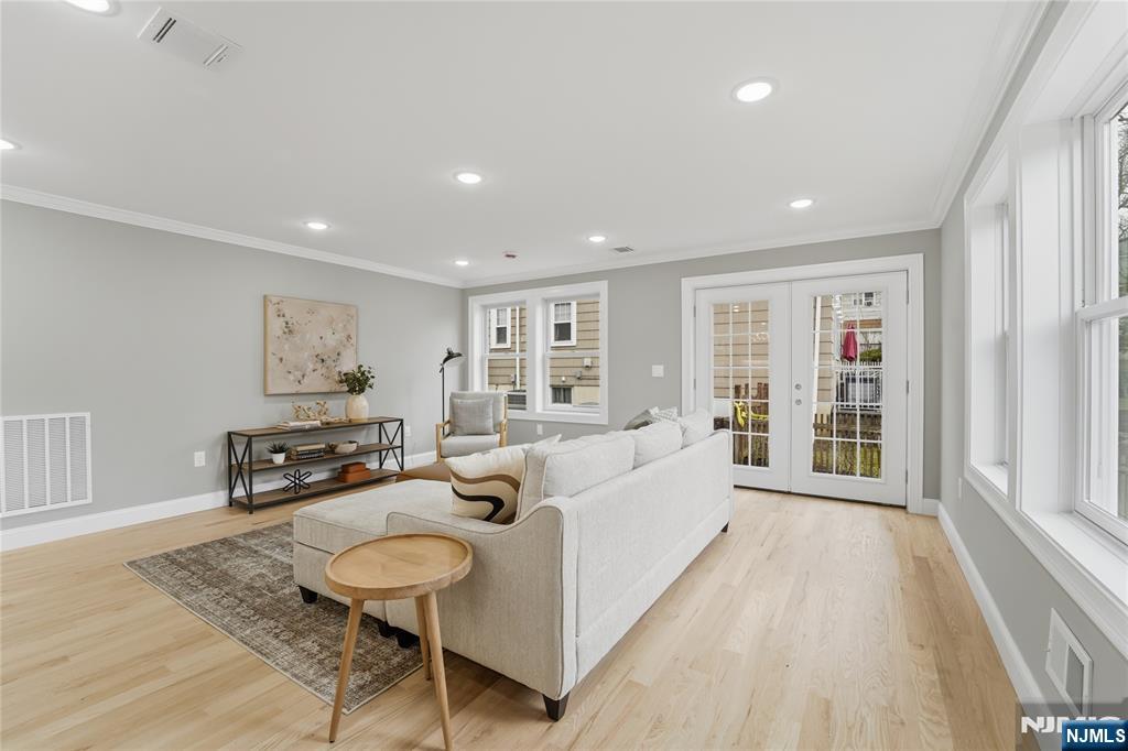 64 Morningside Road Verona, NJ 07044 - Photo 15 of 49 a living room with furniture and a wooden floor
