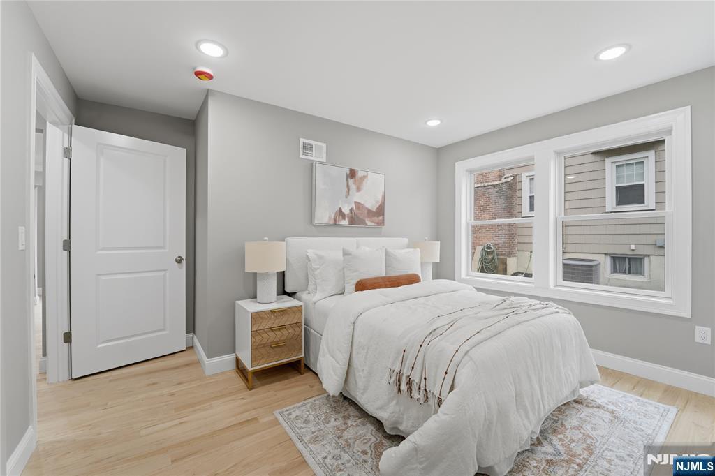 64 Morningside Road Verona, NJ 07044 - Photo 19 of 49 a bedroom with a large bed and a window