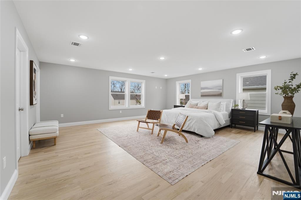 64 Morningside Road Verona, NJ 07044 - Photo 22 of 49 a bedroom with a large bed and a window