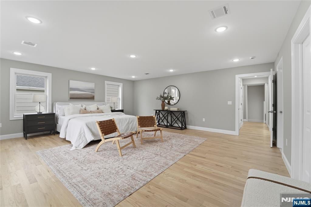 64 Morningside Road Verona, NJ 07044 - Photo 24 of 49 a bed room with a bed and a chair