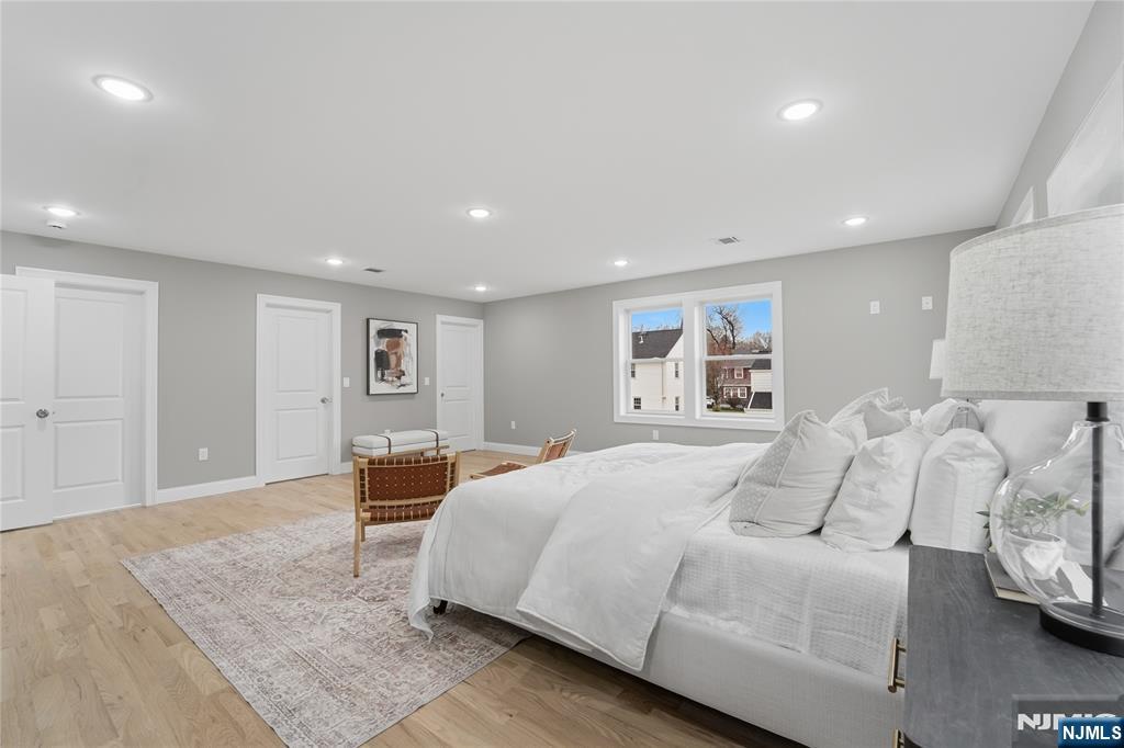 64 Morningside Road Verona, NJ 07044 - Photo 25 of 49 a bedroom with a large bed and a couch