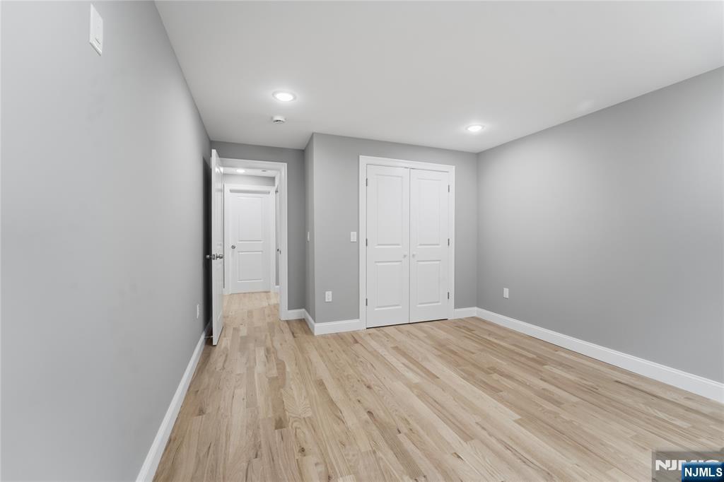 64 Morningside Road Verona, NJ 07044 - Photo 34 of 49 a view of hallway with wooden floor