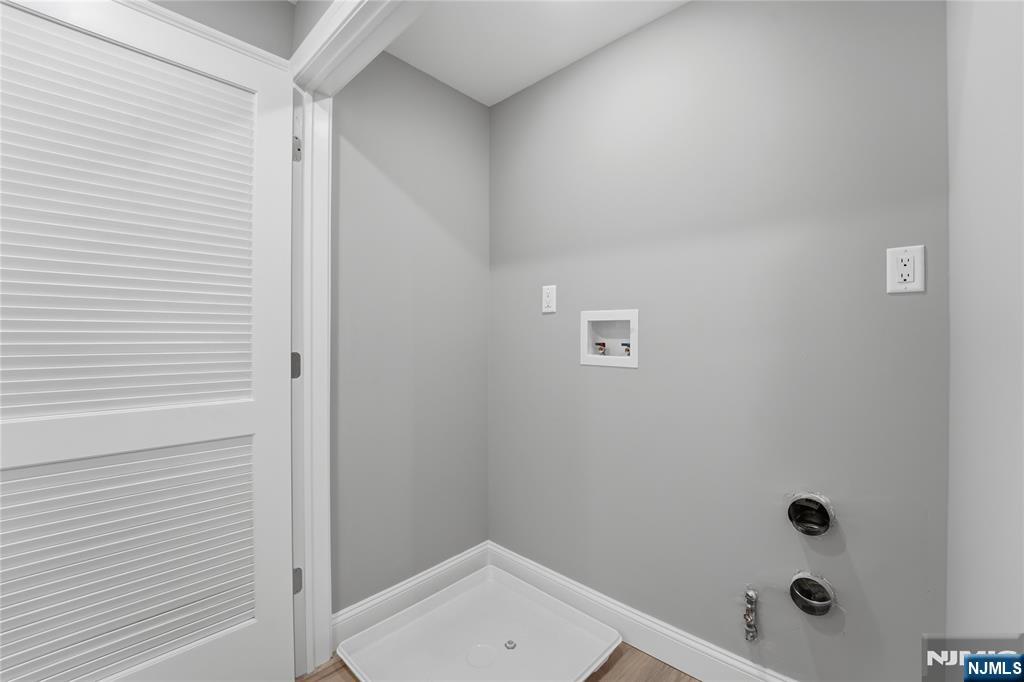 64 Morningside Road Verona, NJ 07044 - Photo 41 of 49 a bathroom with a sink and shower