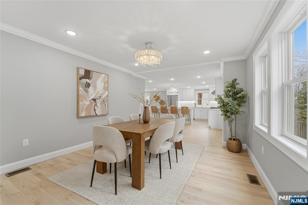 64 Morningside Road Verona, NJ 07044 - Photo 7 of 49 a view of a dining room with furniture window and wooden floor