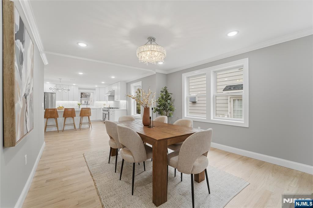 64 Morningside Road Verona, NJ 07044 - Photo 8 of 49 a view of a dining room with furniture and a chandelier