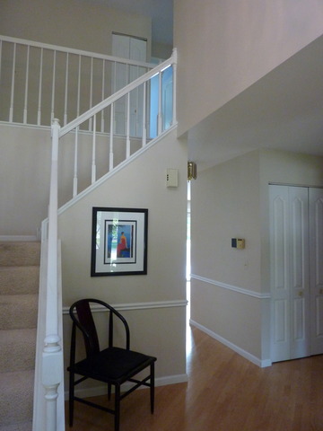 631 Raintree Road Buffalo Grove, IL 60089 - Photo 5 of 22 a view of a hallway with seating area