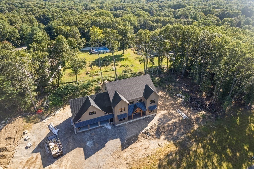 3 Couture Way Middleton, MA 01949 - Photo 8 of 10 an aerial view of a house with swimming pool and green space