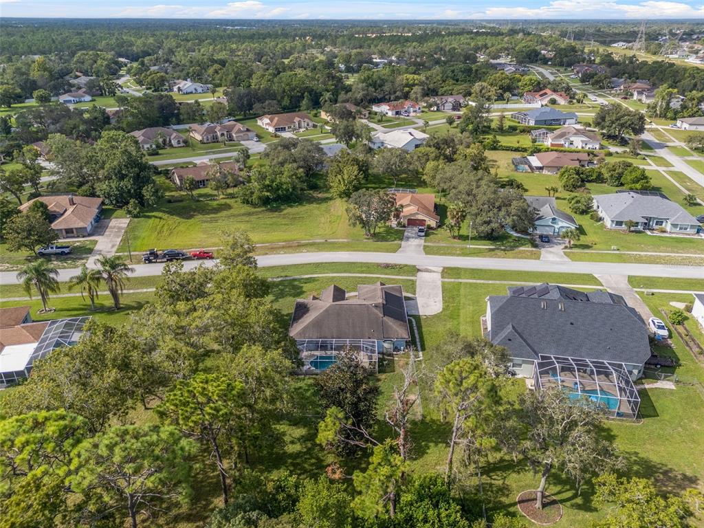 13377 Elise Lane Spring Hill, FL 34609 - Photo 28 of 30 an aerial view of residential houses with outdoor space and swimming pool