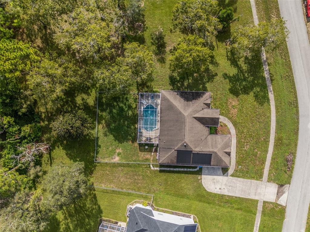 13377 Elise Lane Spring Hill, FL 34609 - Photo 29 of 30 aerial view of a house with swimming pool