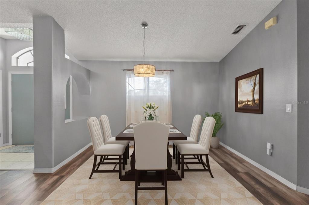 13377 Elise Lane Spring Hill, FL 34609 - Photo 6 of 30 a view of a dining room with furniture and window