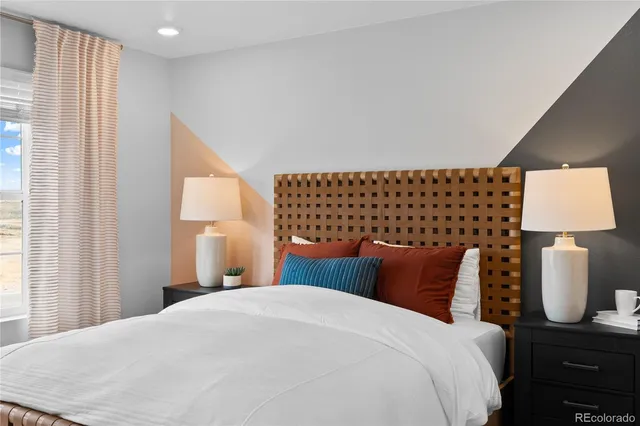 a kitchen with stainless steel appliances granite countertop a refrigerator sink and stove