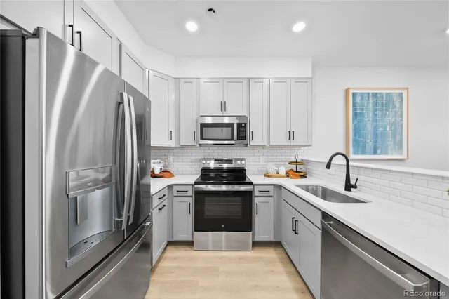 a bathroom with a sink and toilet