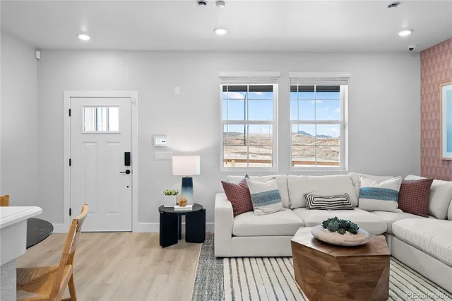 a bedroom with a bed and a lamp