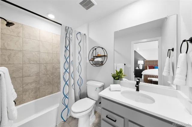 a kitchen with a sink stove and microwave