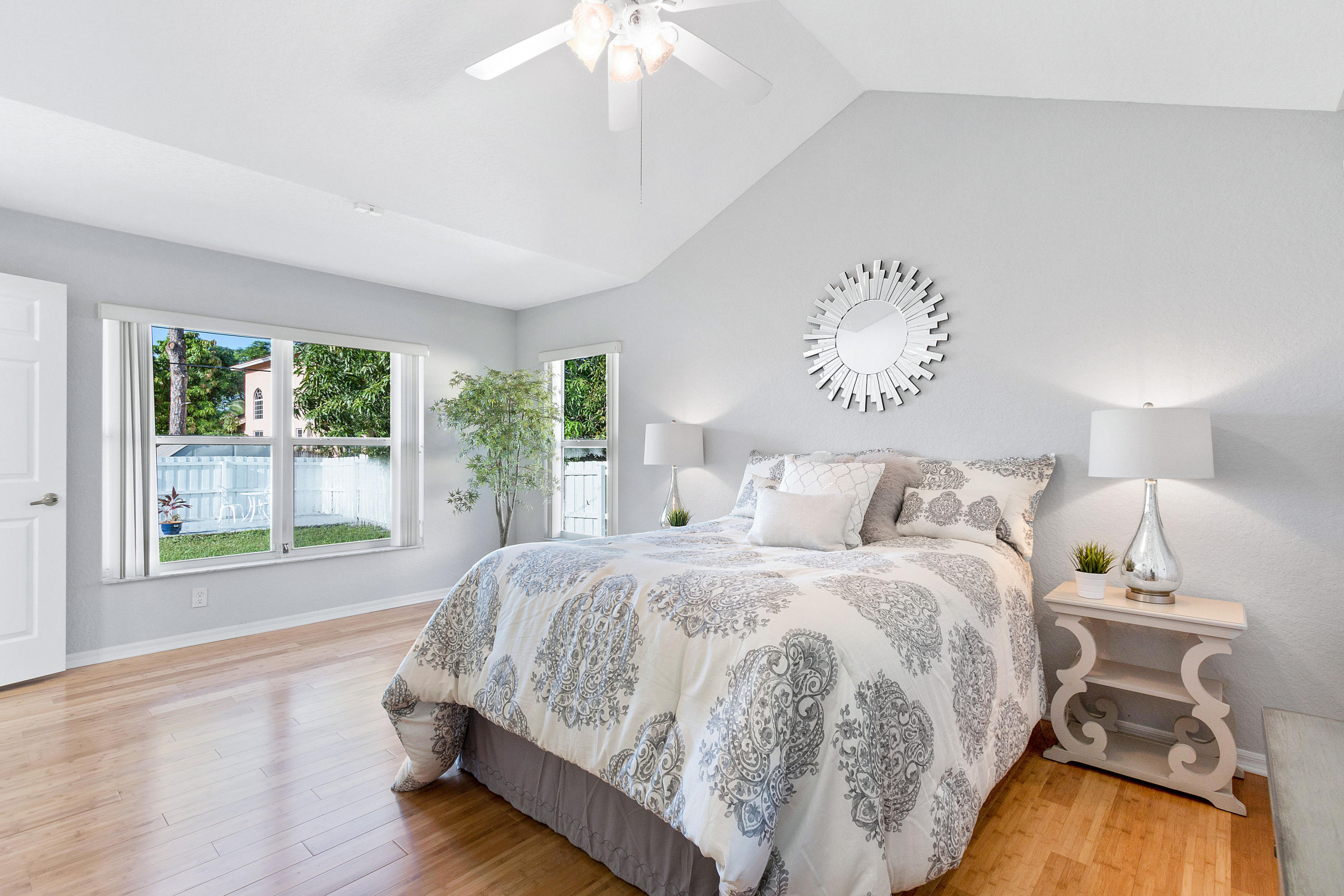 5317 Palm Ridge Boulevard Delray Beach, FL 33484 - Photo 19 of 39 a spacious bedroom with a bed and a window