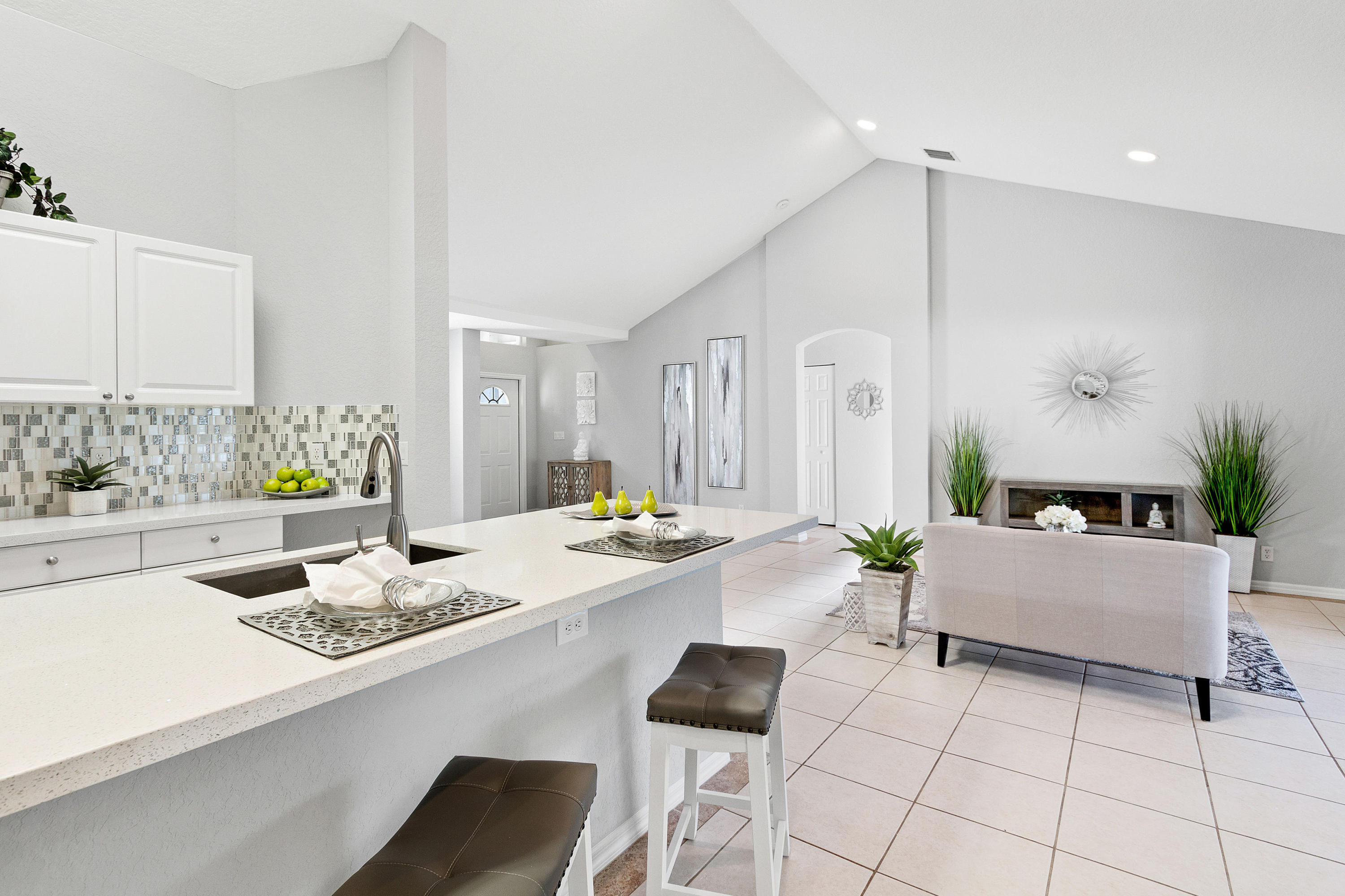 5317 Palm Ridge Boulevard Delray Beach, FL 33484 - Photo 2 of 39 a living room with furniture and wooden floor