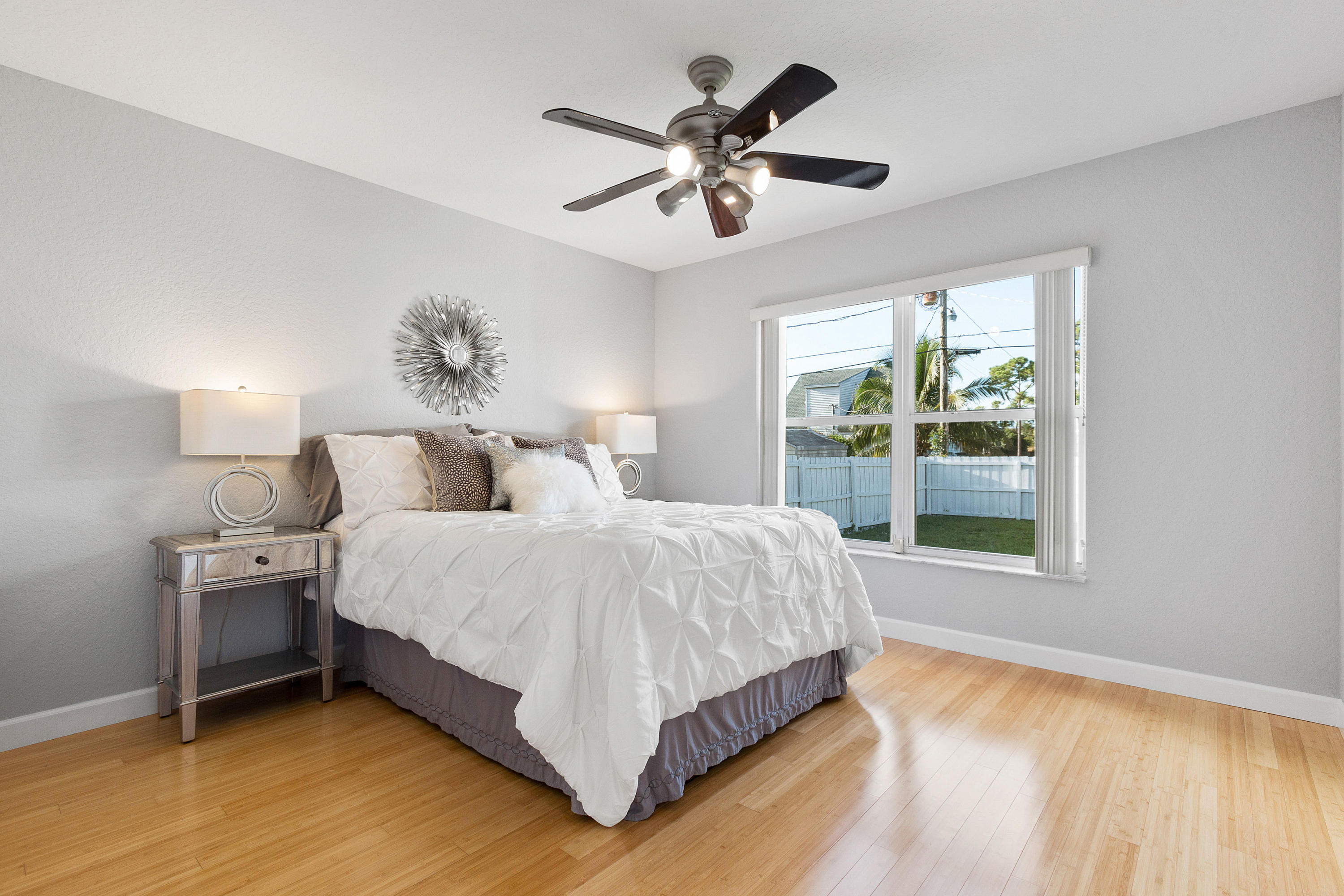 5317 Palm Ridge Boulevard Delray Beach, FL 33484 - Photo 27 of 39 a bed room with a bed and a window
