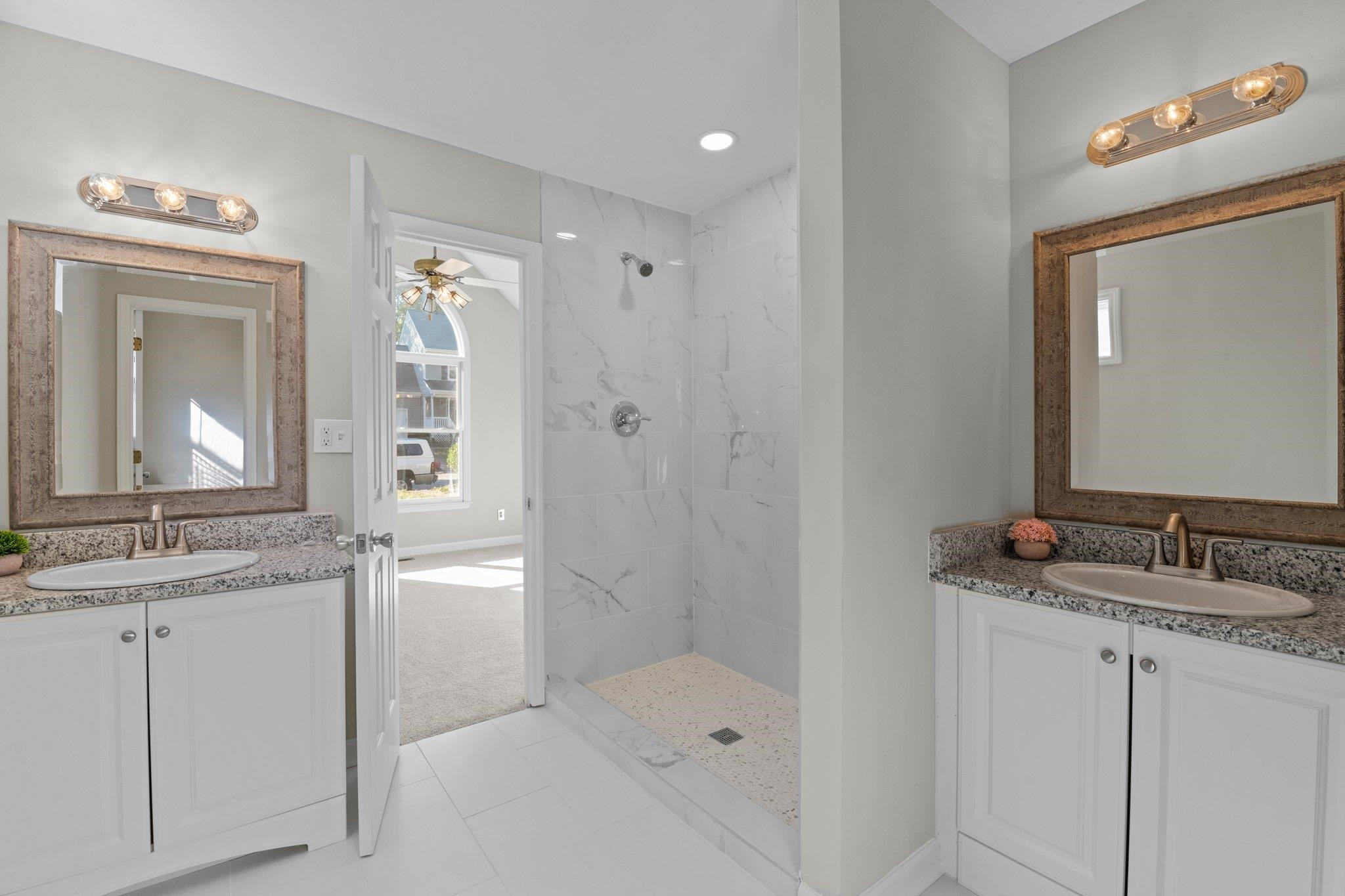 4405 Birmingham Way Raleigh, NC 27604 - Photo 7 of 24 Updates include new vanities, walk in shower, new tile and countertops Master Bath/Spa