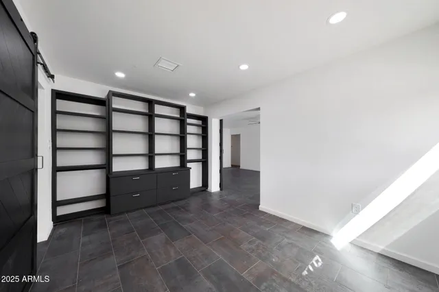 a view of a livingroom with a staircase