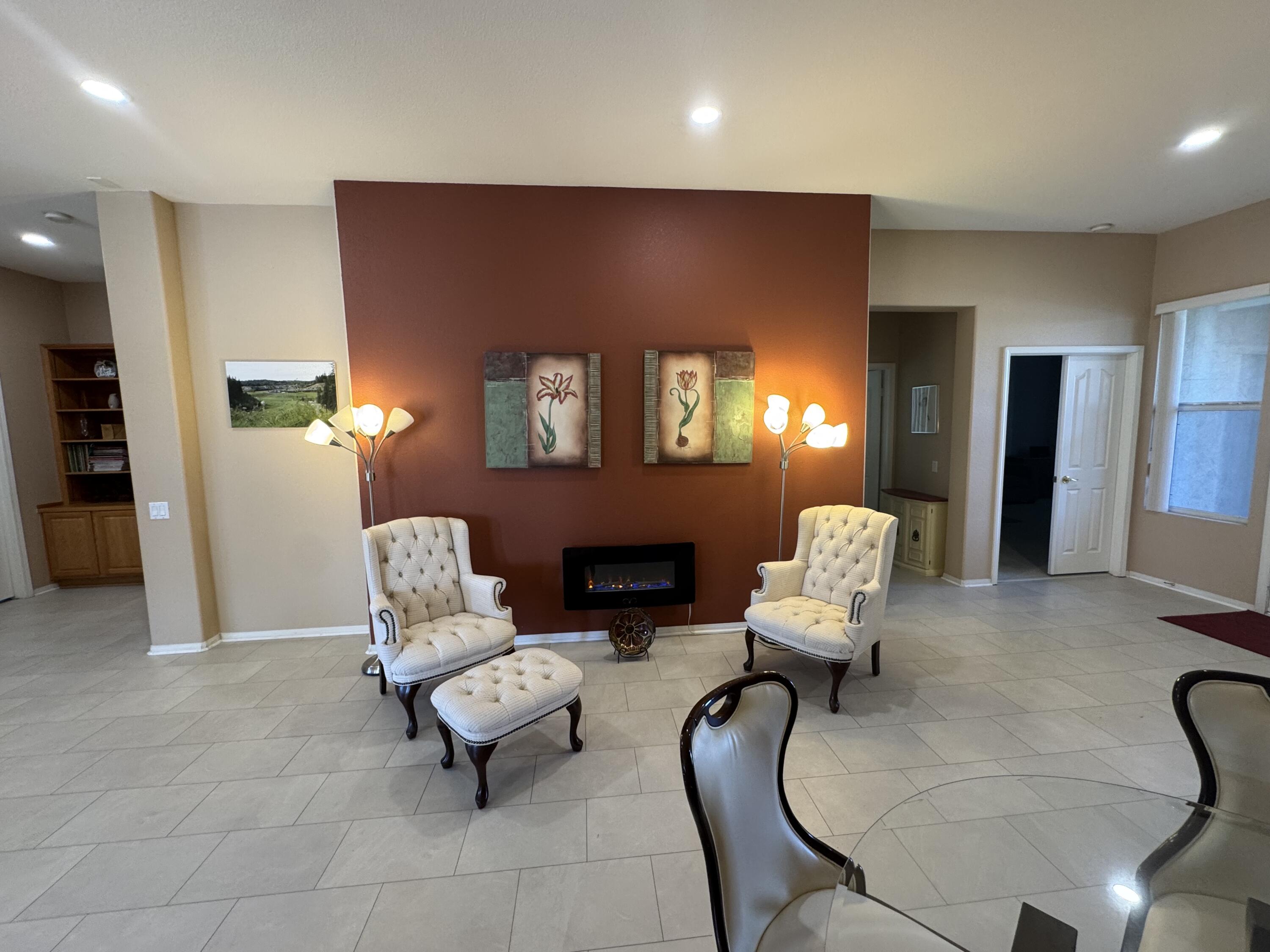 44414 Royal Lytham Drive Indio, CA 92201 - Photo 14 of 47 a living room with furniture and a fireplace