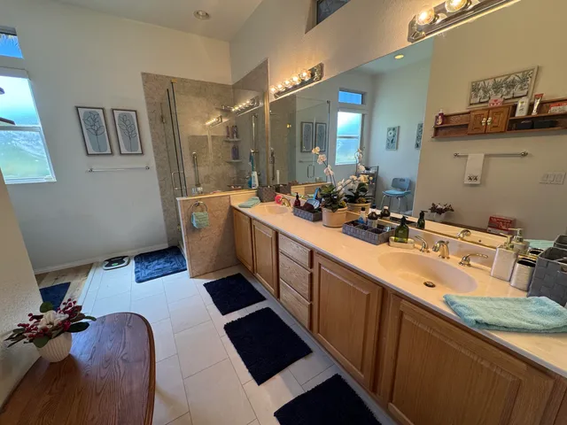 a bathroom with sink and mirror