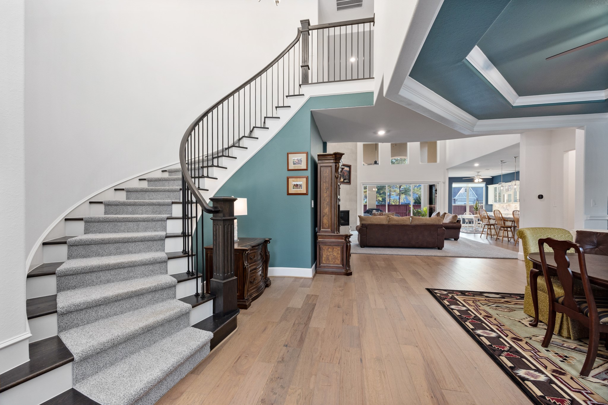 8538 Tynan Ridge Drive Magnolia, TX 77354 - Photo 19 of 50 a view of entryway and hall with wooden floor