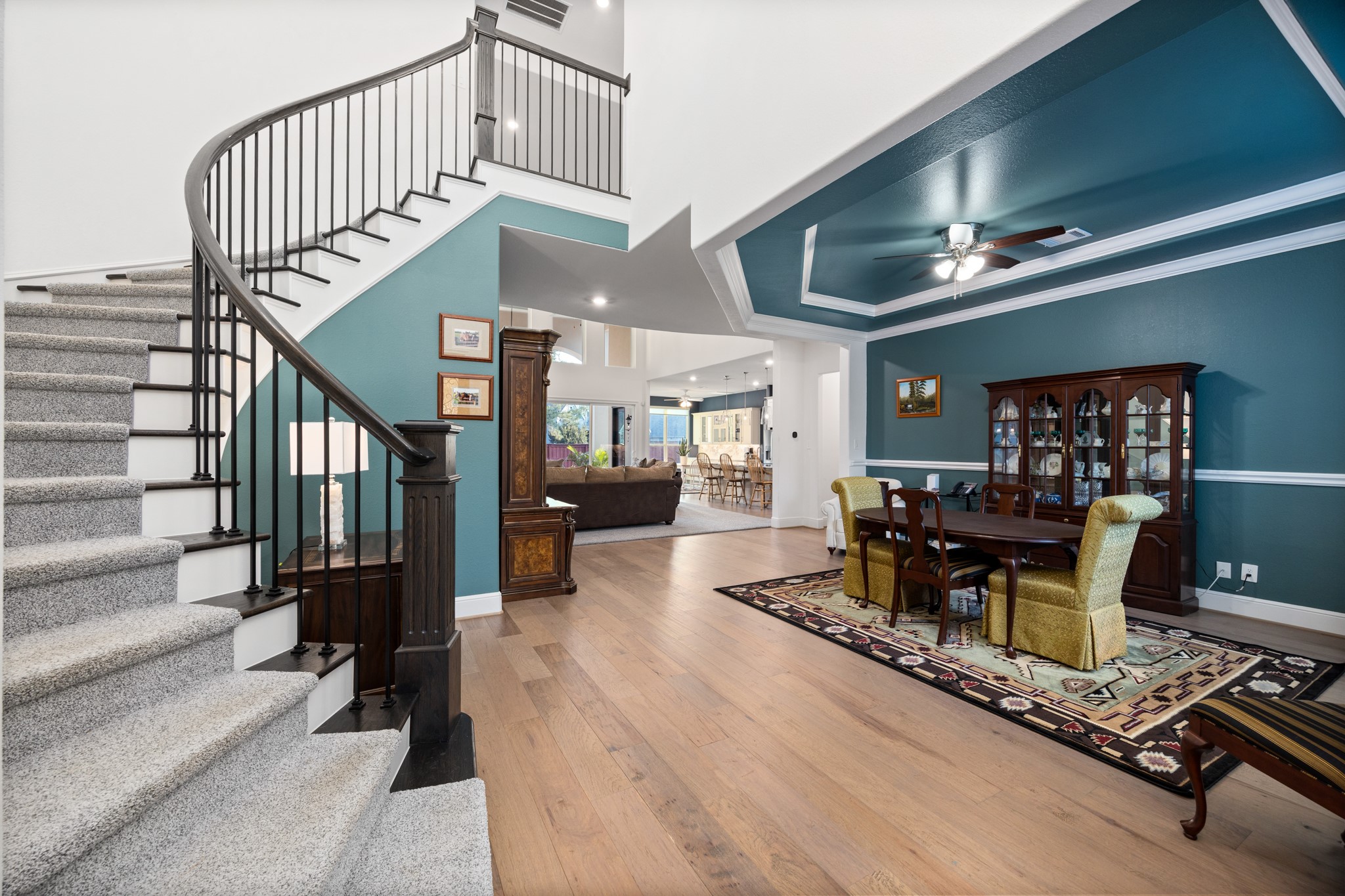8538 Tynan Ridge Drive Magnolia, TX 77354 - Photo 20 of 50 a view of a livingroom with furniture staircase and a living room