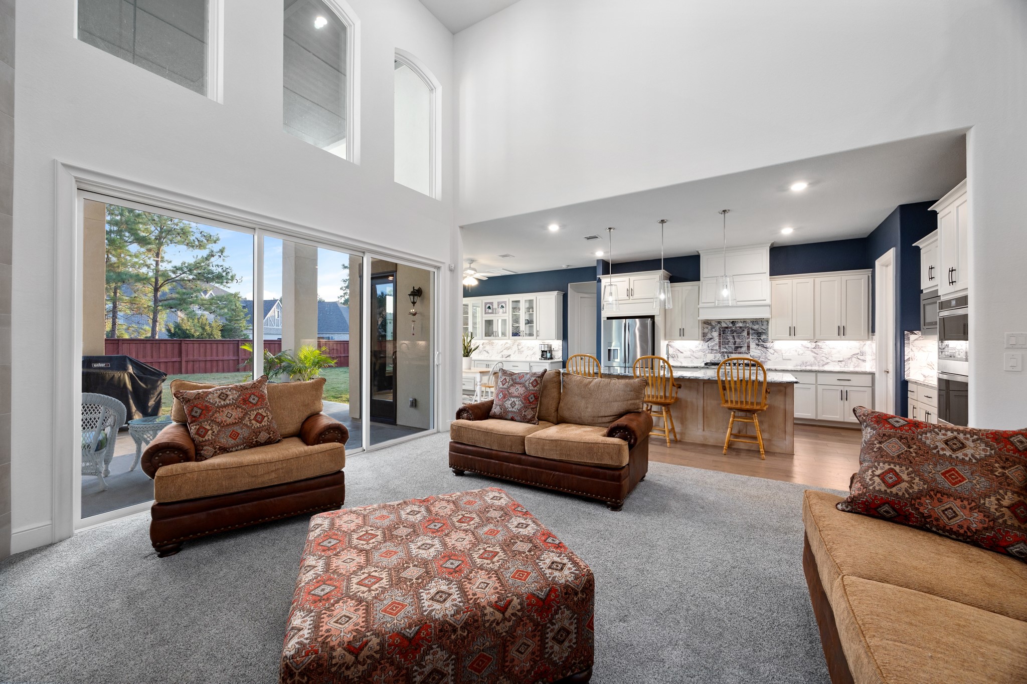 8538 Tynan Ridge Drive Magnolia, TX 77354 - Photo 25 of 50 a living room with furniture and a large window